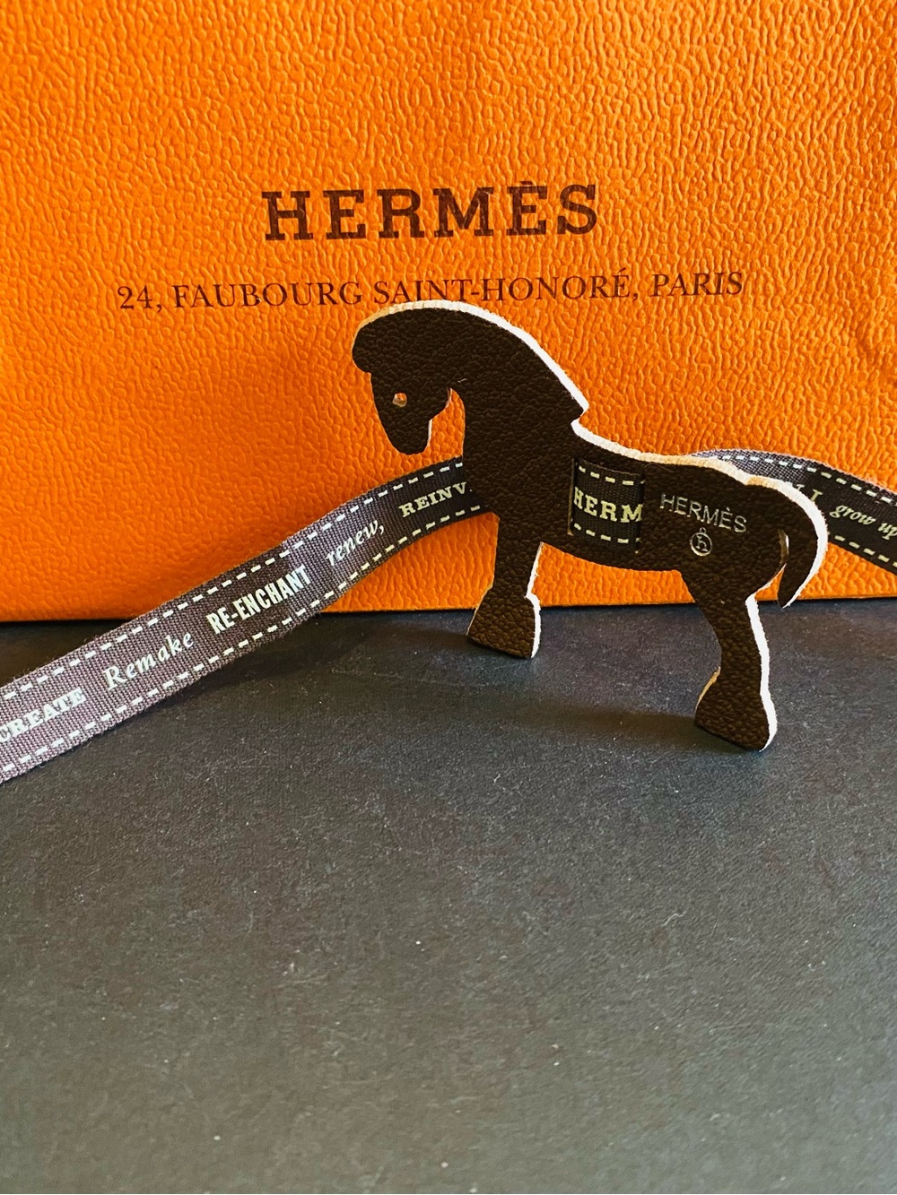 Hermès Petit H Brown Leather Horse Charm with Hermes Ribbon. Authentic.